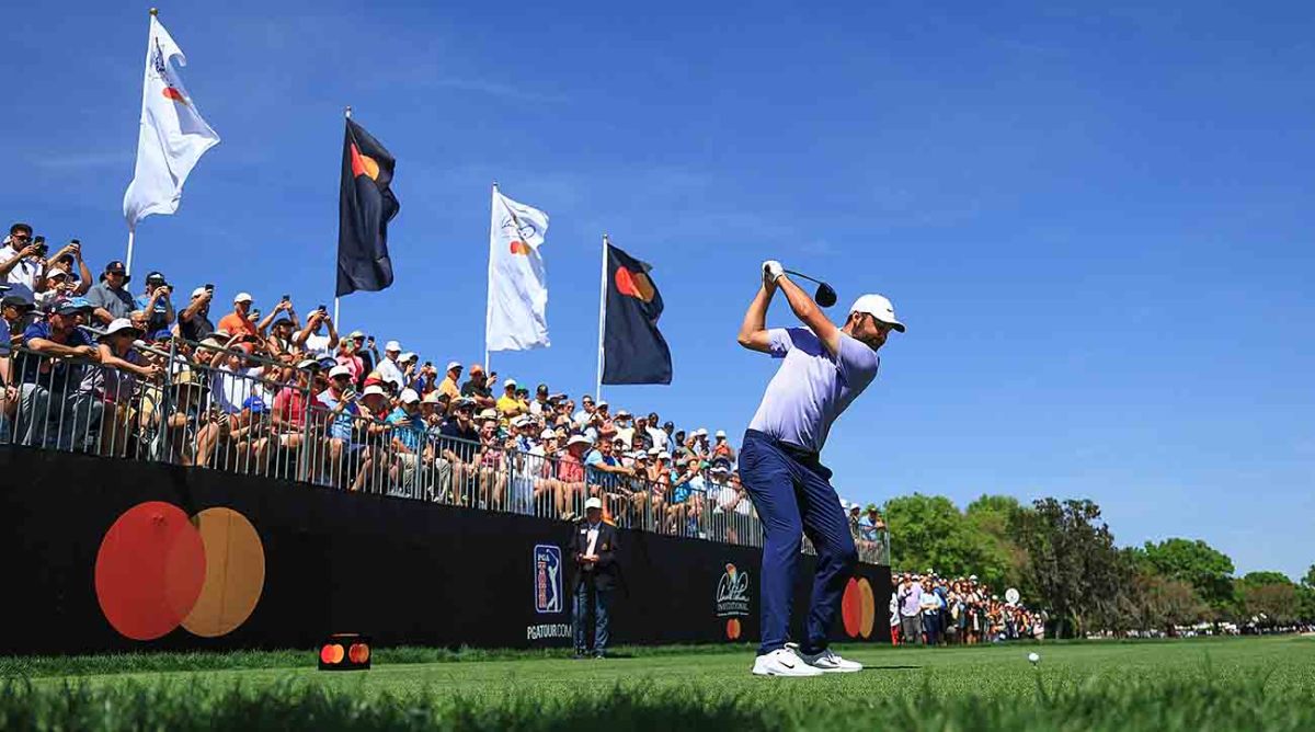 Scottie Scheffler hits a tee shot on the first hole during the final round of the 2024 Arnold Palmer Invitational at Bay Hill Golf Course in Orlando, Fla.